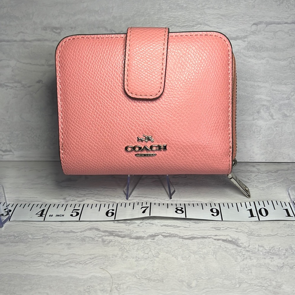 Light pink coach, wallet with zipper